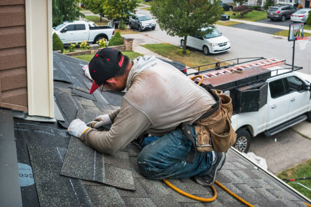Professional Roofing technician working in Marina, CA